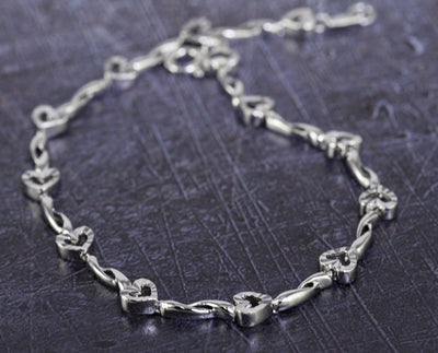 Large Sterling Silver Diamond Cut Hearts Bracelet